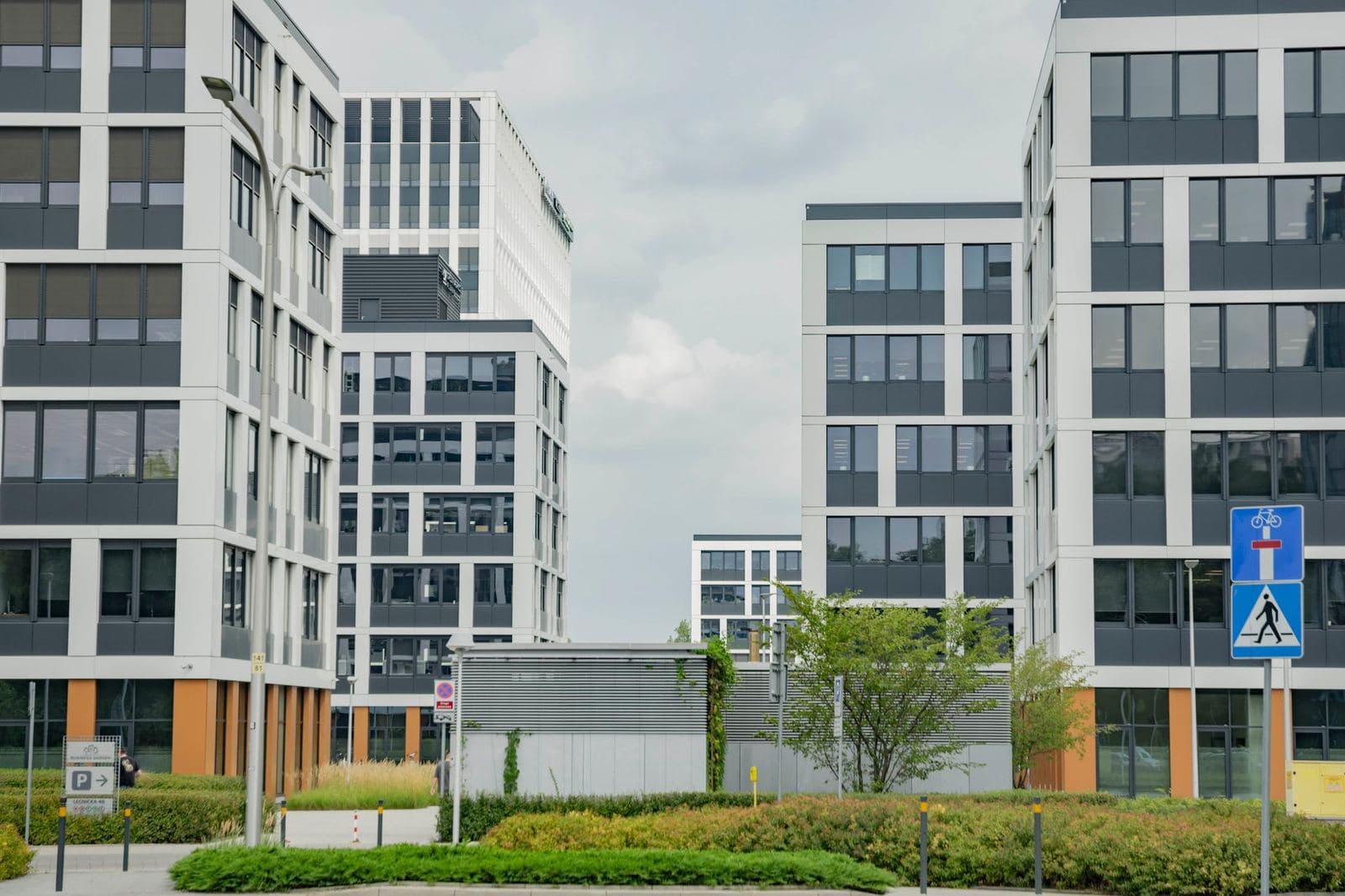 Modern office buildings with landscaped walkways