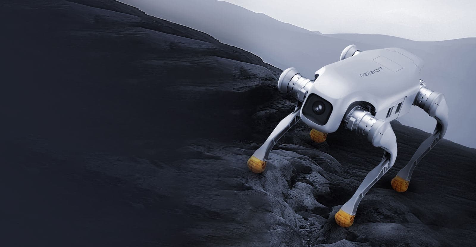 Quadruped robot walking across rough dark terrain